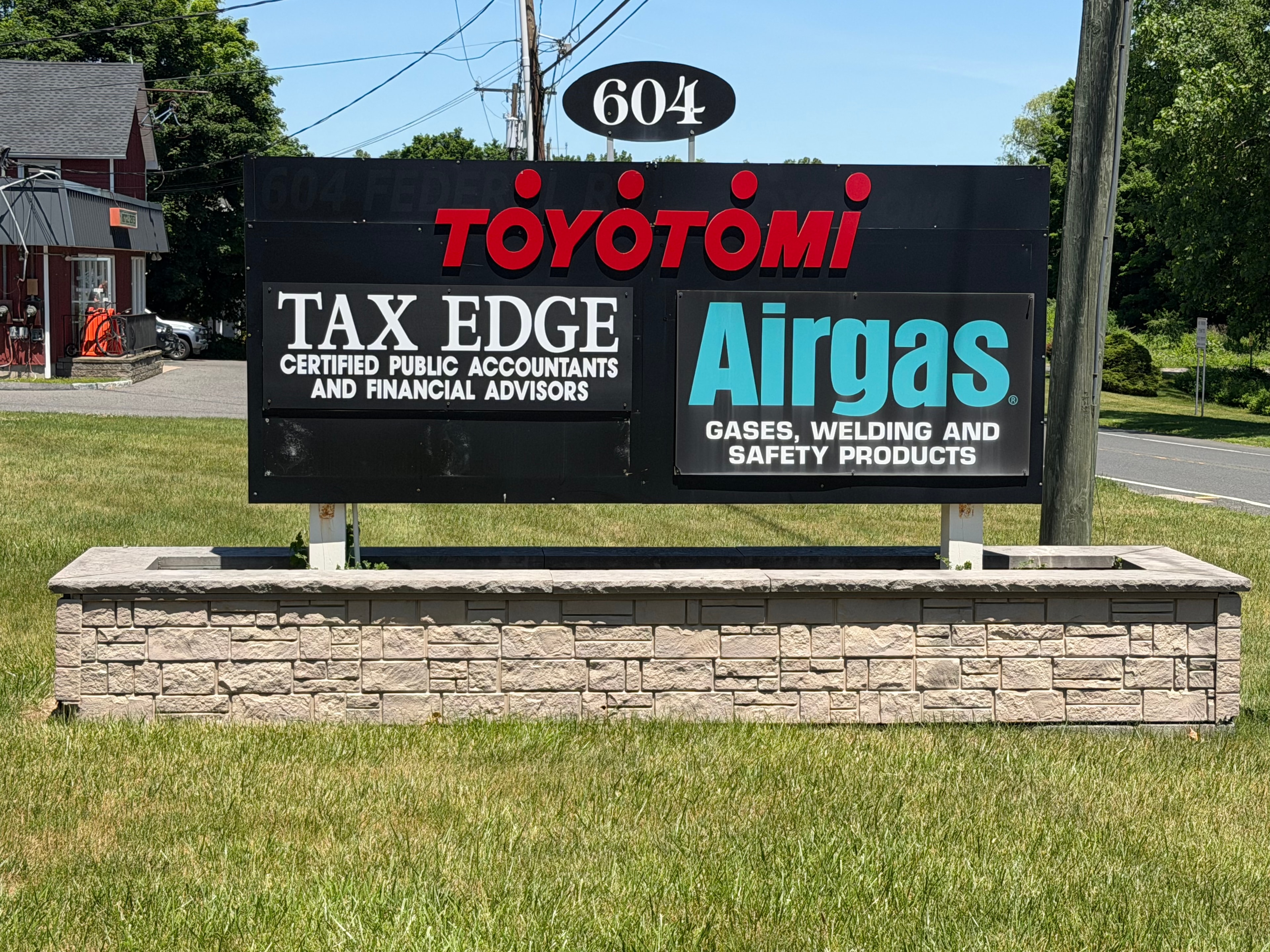 Tax Edge sign at 604 Federal Road